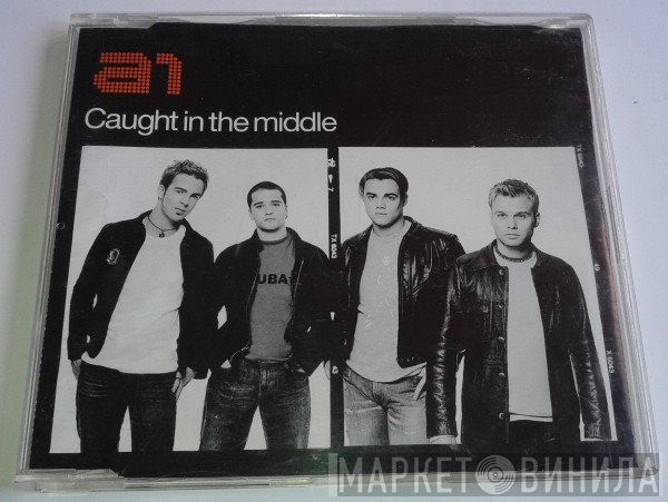 A1  - Caught In The Middle