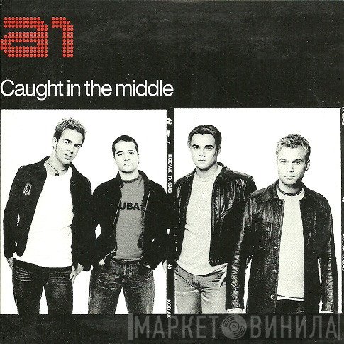 A1  - Caught In The Middle