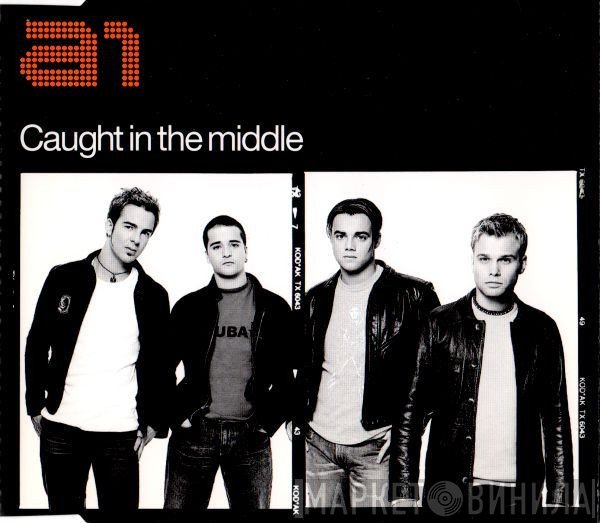 A1  - Caught In The Middle