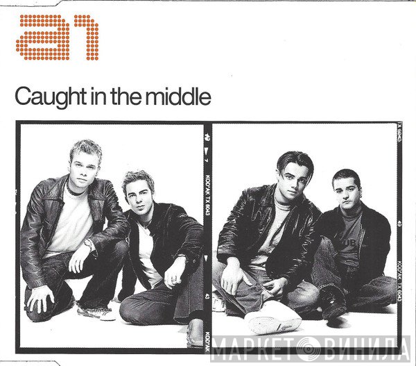 A1  - Caught In The Middle