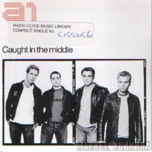 A1  - Caught In The Middle