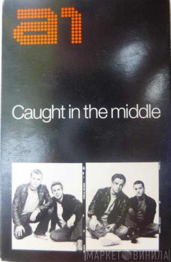 A1  - Caught In The Middle
