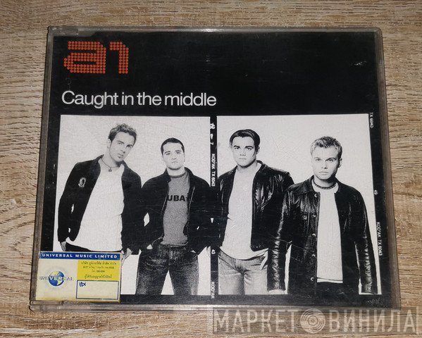 A1  - Caught In The Middle