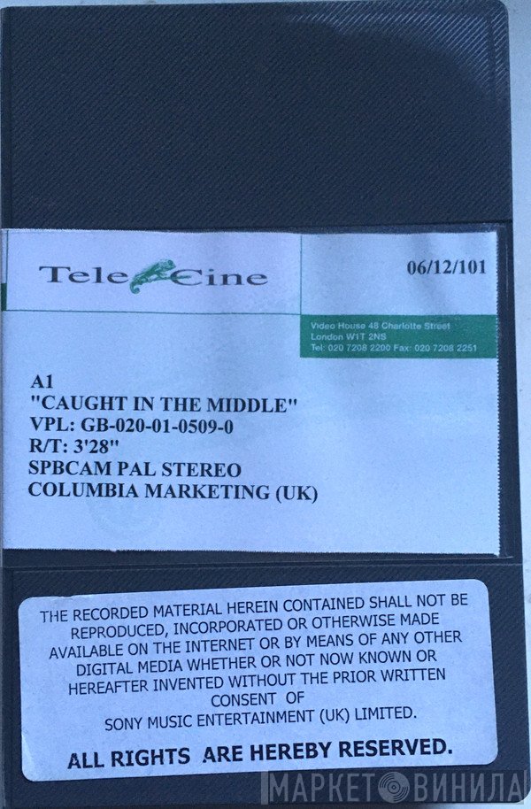 A1  - Caught In The Middle