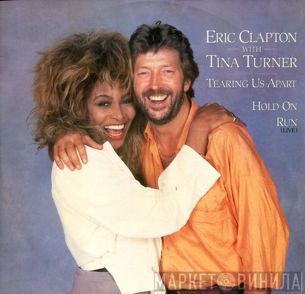 Eric Clapton, Tina Turner - Tearing Us Apart