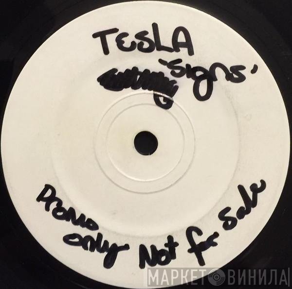 Tesla  - Signs