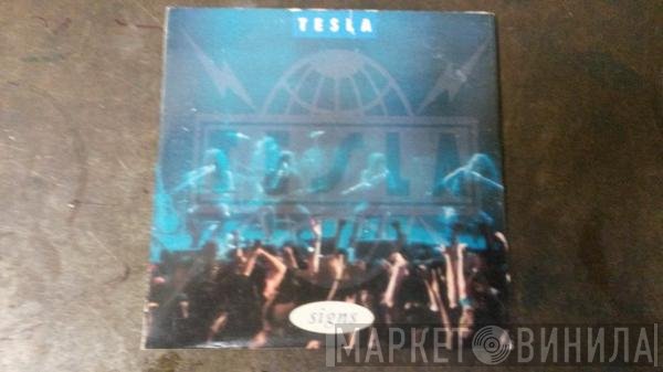 Tesla  - Signs
