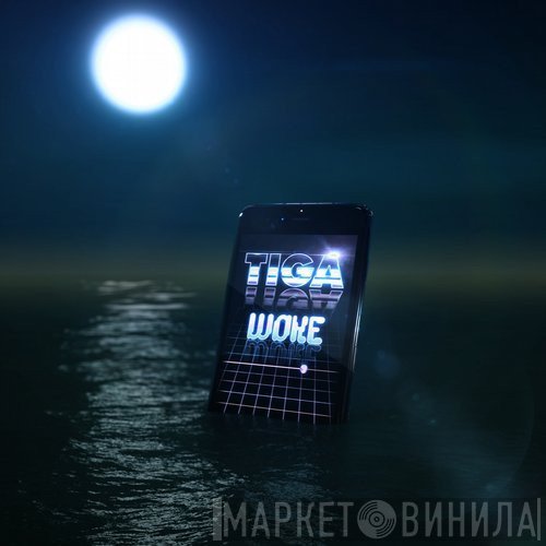 Tiga  - Woke