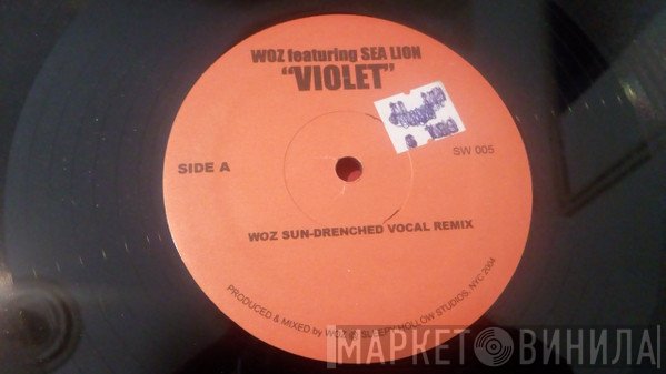 Woz Featuring Seal  - Violet